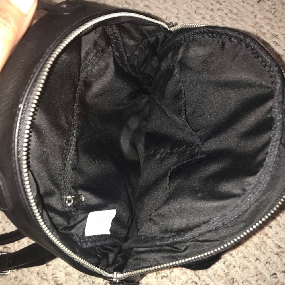 Basic black Pom Pom backpack. - Picture 3 of 4